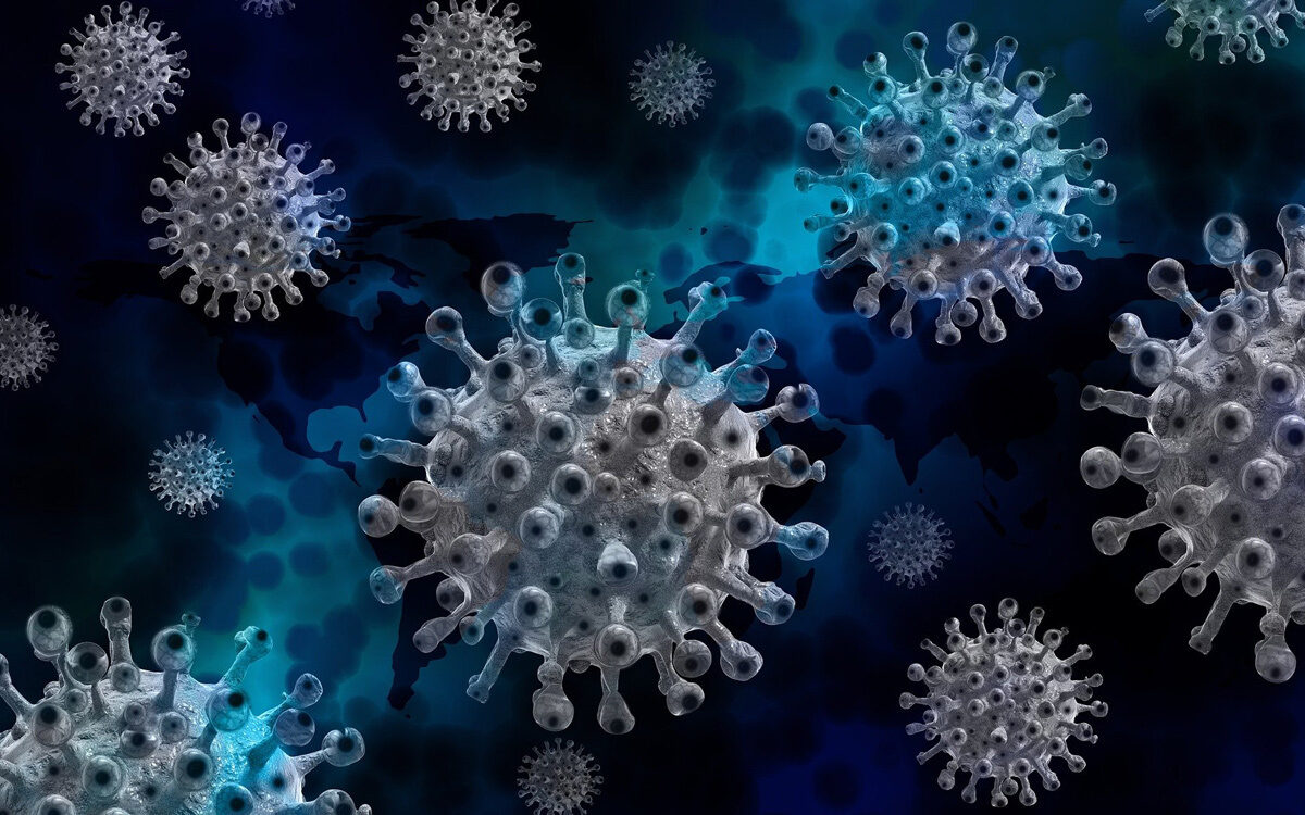 Eine Darstellung des Coronavirus in dunkelblau Eine Darstellung des Coronavirus in dunkelblau